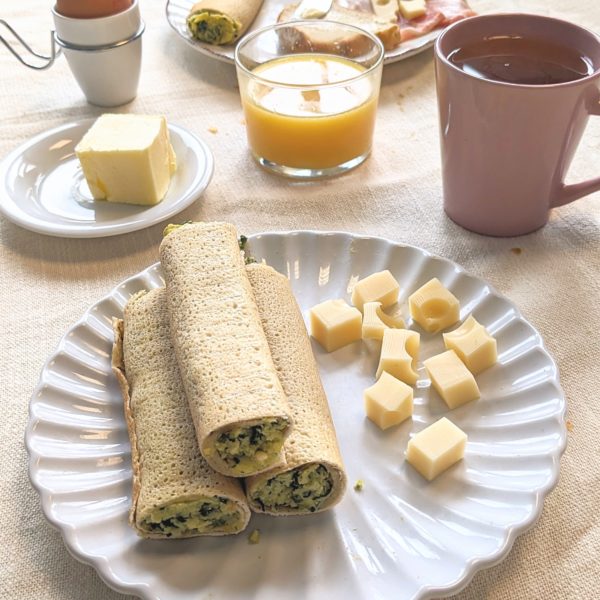 Breakfast with crêpes spinach egg and emmental